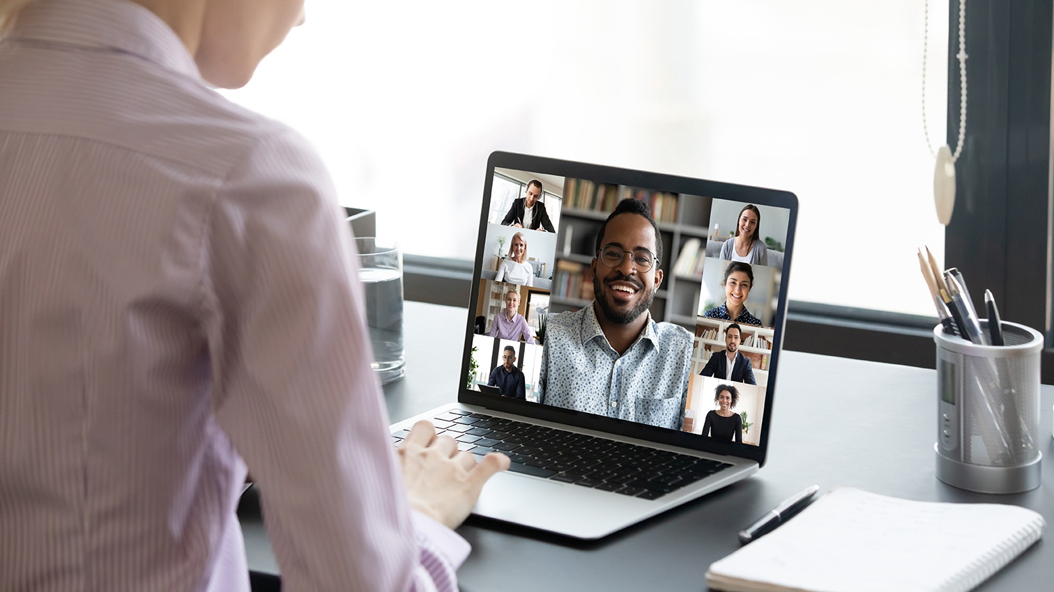 a team of educators engaging in virtual coaching and mentoring