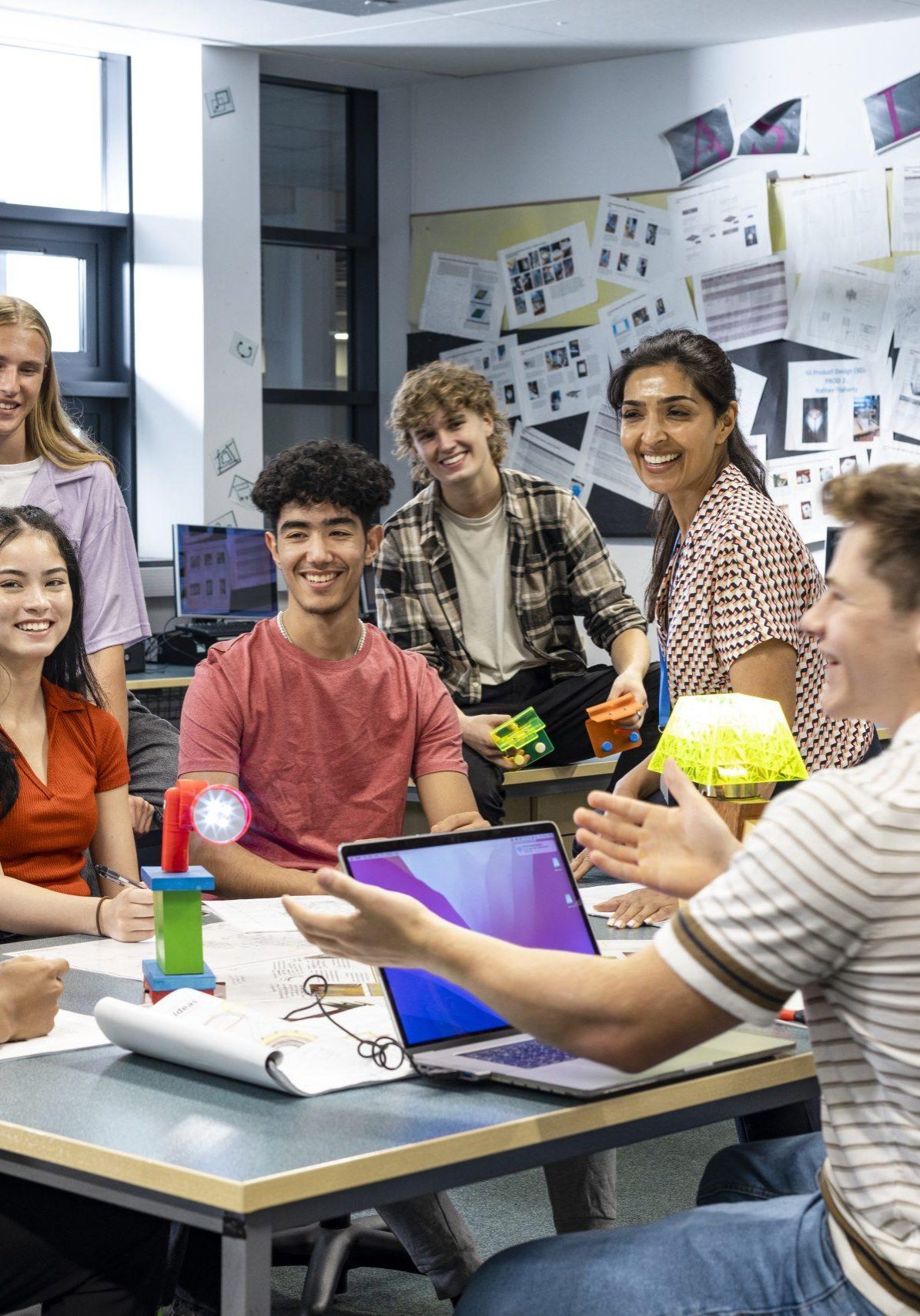 Teacher and Students Laughing in Class