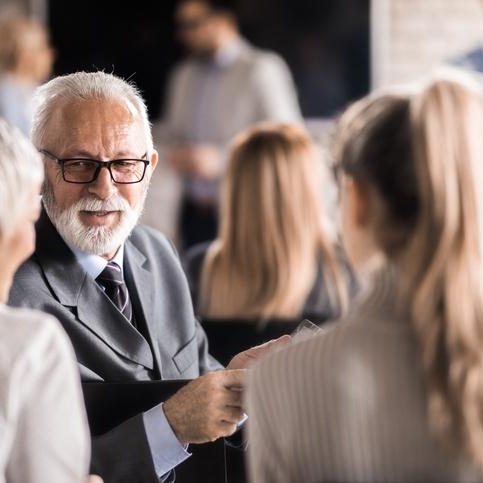 happy senior businessman cooperating